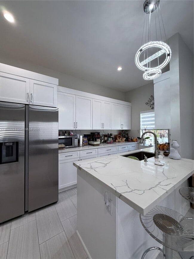 Building Photo - 3341 NW 18th Terrace Unit B