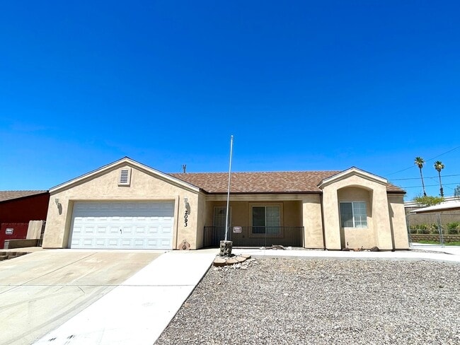 Building Photo - Inviting 3 Bedroom Home with RV Parking an...
