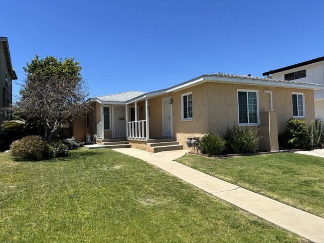 Building Photo - 8437 Lilienthal Ave Unit Front
