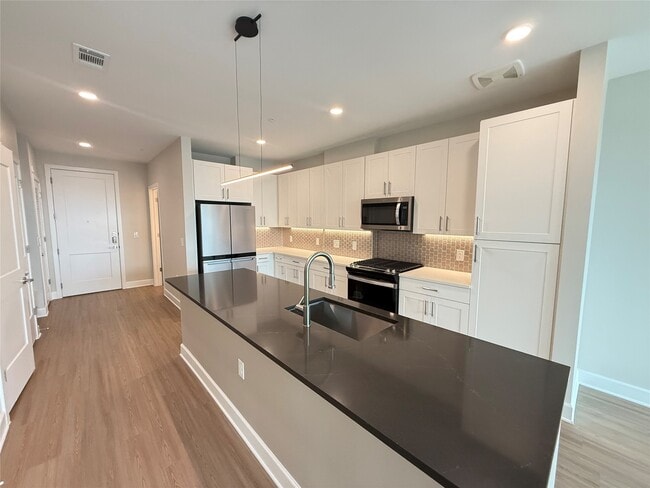 Building Photo - 716 Waugh Dr Unit A20.723 Rental
