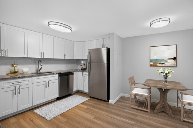 Elevate your lifestyle at Eagle Rock Apartments at Swampscott. This beautifully designed kitchen features modern appliances, sleek cabinetry, and an inviting dining area. Perfect for culinary enthusiasts and entertaining. Schedule your tour today!