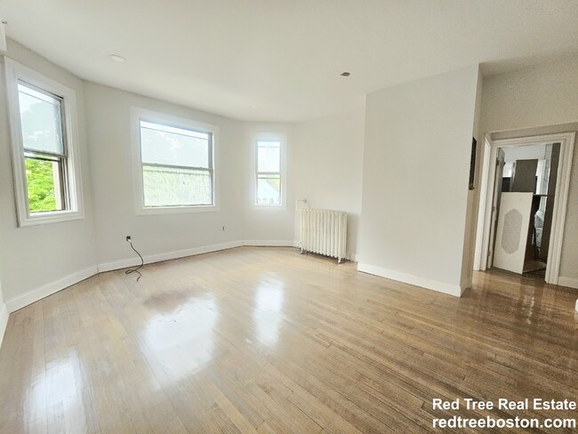 Building Photo - 457 Centre St Unit 302