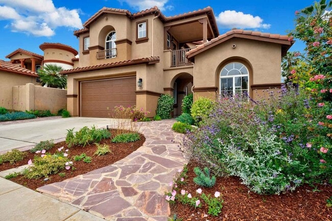 Building Photo - Gated corner lot home walking distance to the beach