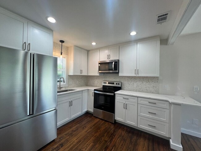 Photo - ANNUAL ** $1,450/month ** 3/4 Mile from Su...