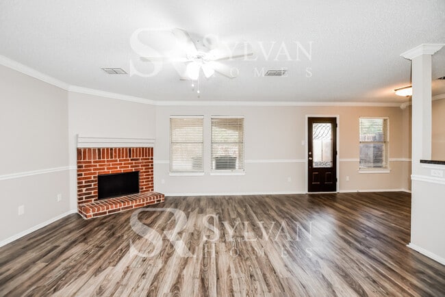 Photo - The living is easy in this gorgeous 4BR, 2.5BA brick home