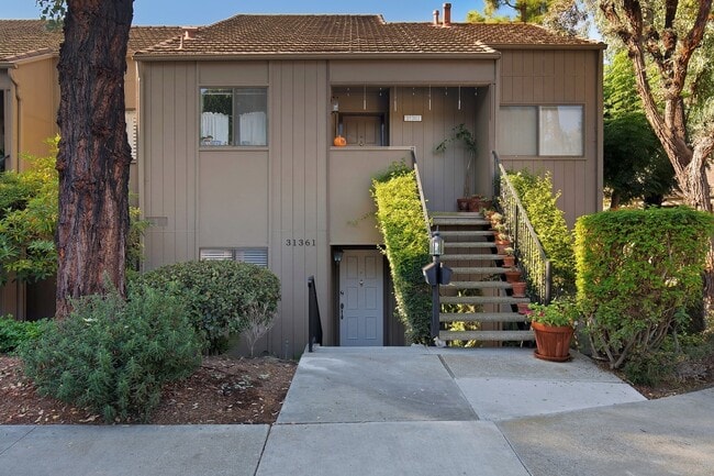 Building Photo - Lake and Golf Course View- Remodeled Condo w/ 2 Car Garage!