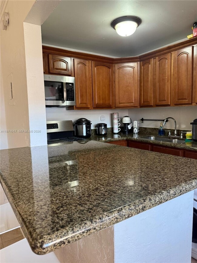 Photo - 1230 W 54th St Unit 211A