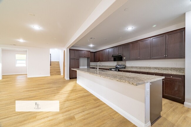 Photo - Bright & Spacious 4-Bedroom Home with Open Living Spaces