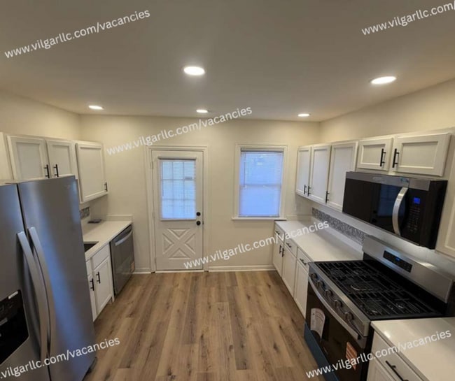 Photo - Spacious 4-Bedroom • 2-Bathroom Single-Family Home