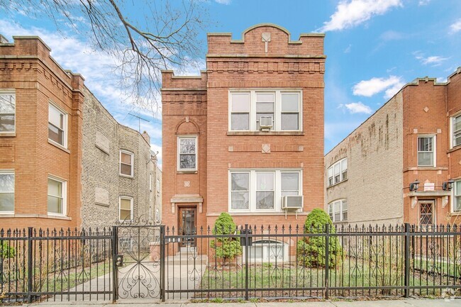 Building Photo - 2441 N Tripp Ave Unit 1 Rental