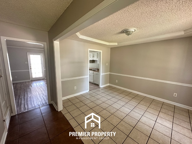 Photo - Beautiful 4BR/2BA Near Southwind | 1,853 Sq Ft, Dual Dining Areas, Fireplace & Garage