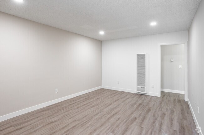 1BR, 1BA - 800SF Living Room - Monticello Apartments