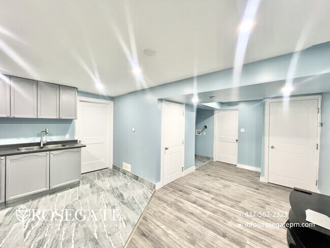 Photo - Bright 1-Bedroom + Den Basement Apartment with All Utilities Included! Unit 2
