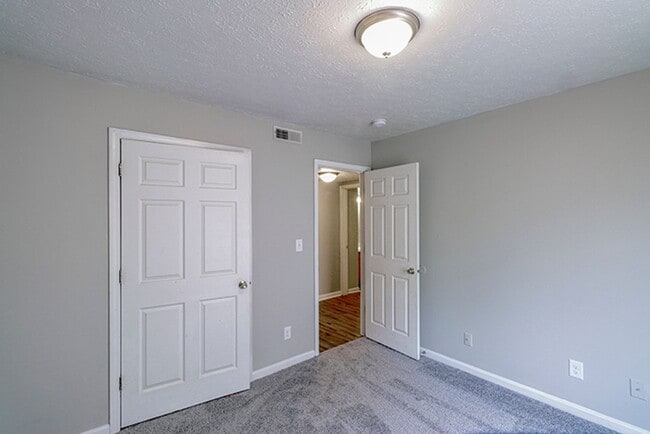 Building Photo - 8508 Standing Oak Dr Unit 1