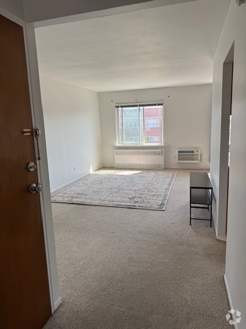 Building Photo - 25-38-38 71st St Rental