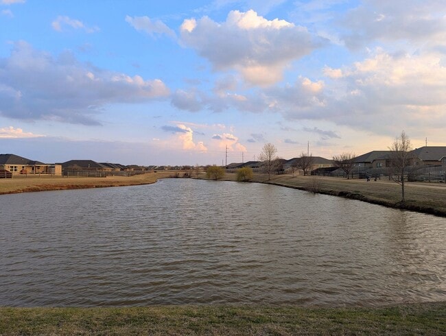 Photo - Modern Norman Home | Storm Shelter, Covered Patio, Community Pond & Park!