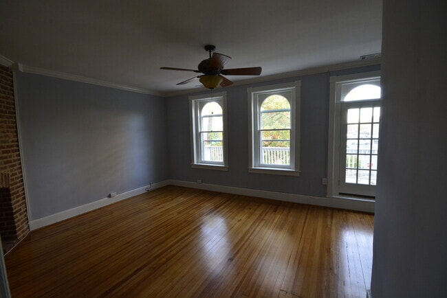 Living Room - Opens to Upper Front Porch - 7104 Maple Ave Unit Maple
