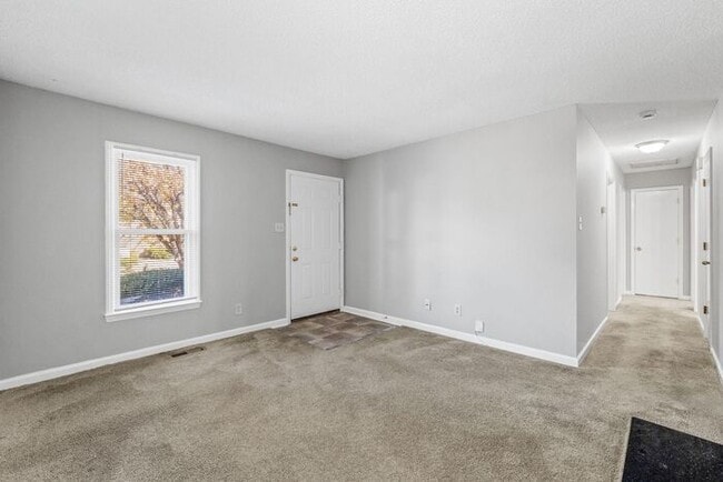 Photo - NE Home - Updated Kitchen and Bathrooms! SS Appliances, Fire Place, Front Porch & Deck, Fenced Yard!