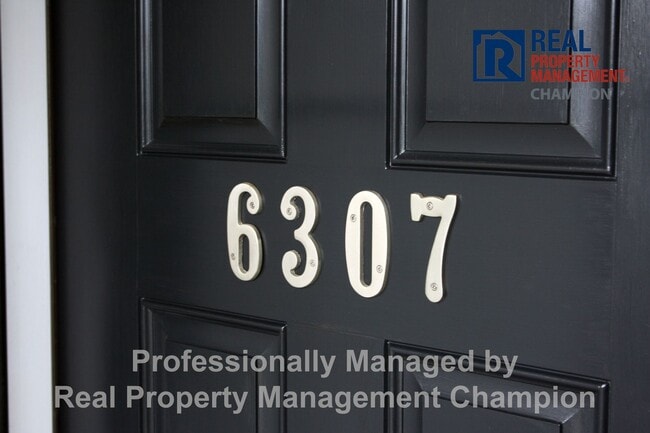 Photo - Beautiful home boasts open floorplan, screened porch, and spacious fenced yard