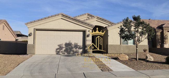Building Photo - Beautiful 3+2 Split Floor plan home with RV parking close to KRMS's Hualapai Campus!