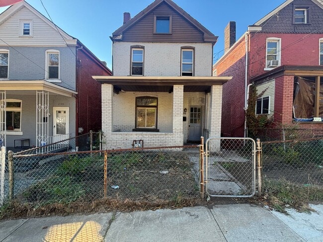 Photo - Updated flooring, finished basement, and g...