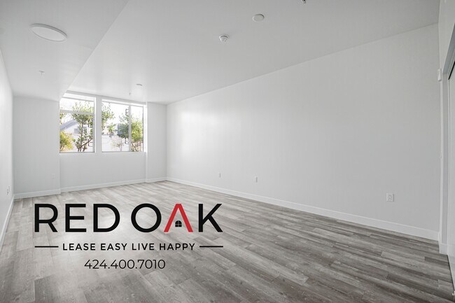 Building Photo - 700 N Spaulding Ave Unit 210