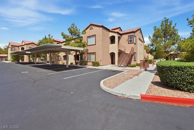 Building Photo - 9580 W Reno Ave Unit 266