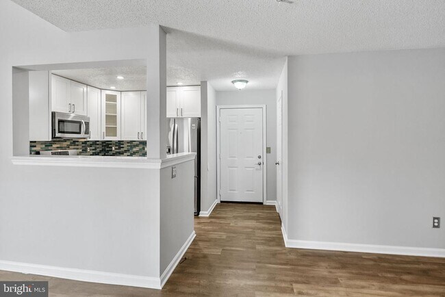 Building Photo - 12024 Taliesin Pl Unit 33