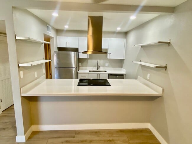 Building Photo - Bright Upgraded Kitchen in La Tierra 2 Bedroom 2 Bathroom Condo