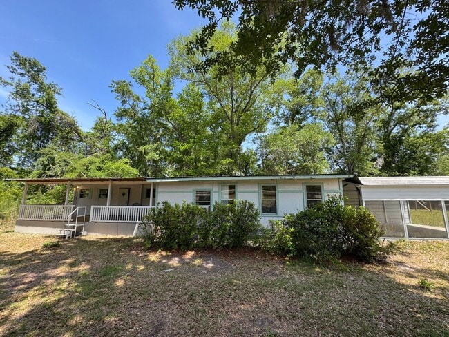 Building Photo - 2BR/1BA Mobile Home on ½ Acre – Pet-Friendly – Lake City, FL