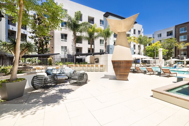 Outdoor Seating Area and Pool Deck | Elan Huntington Beach | Apartments in Huntington Beach, CA