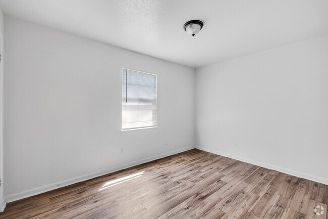 3BR, 1BA - 650SF - Bedroom - Move-In Special | Affordable Angleton Apts
