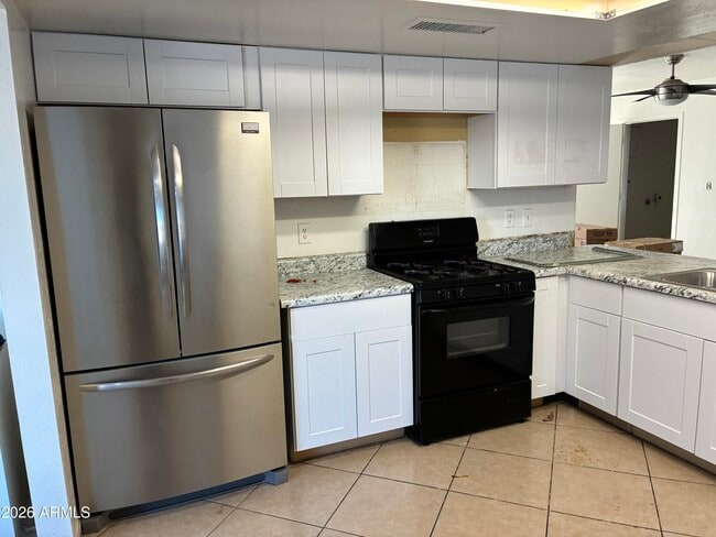 Photo - 8819 W Roma Ave