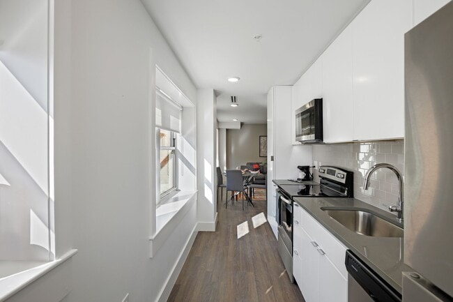 Building Photo - 3835 Main St Unit - 902