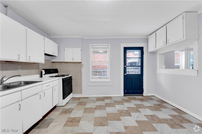 Building Photo - 7945 Lorain Ave Unit 1/DN Front Rental