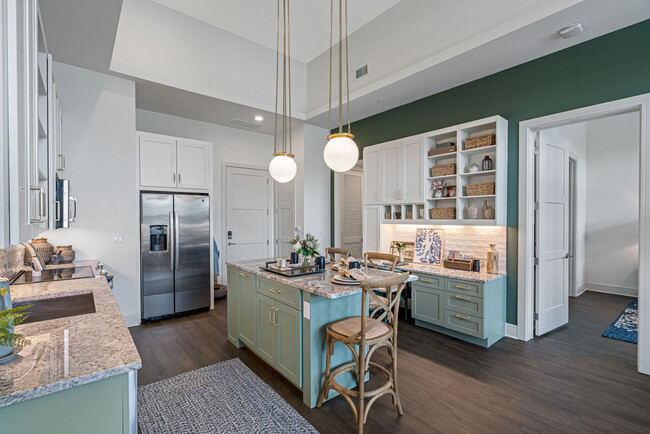 Expansive Kitchen Islands with Pantry Storage - Cortland Colburn Apartments