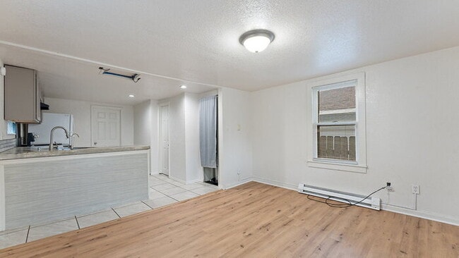Photo - "Cozy 1-Bed Oasis in Springdale: Perfect Blend of Comfort & Convenience!"