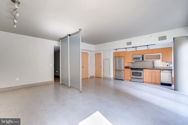 Building Photo - 1133 14th St NW Unit 203