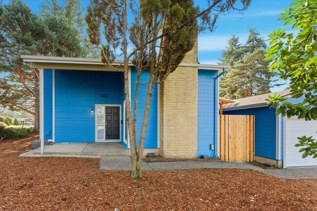 Photo - Updated 3BD/2BA Highland Duplex • Private Garage, Fireplace & Outdoor Space!