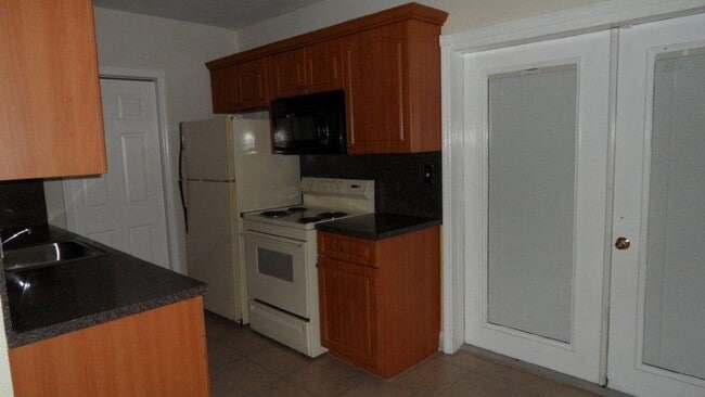 Building Photo - 700 N 70th Ave