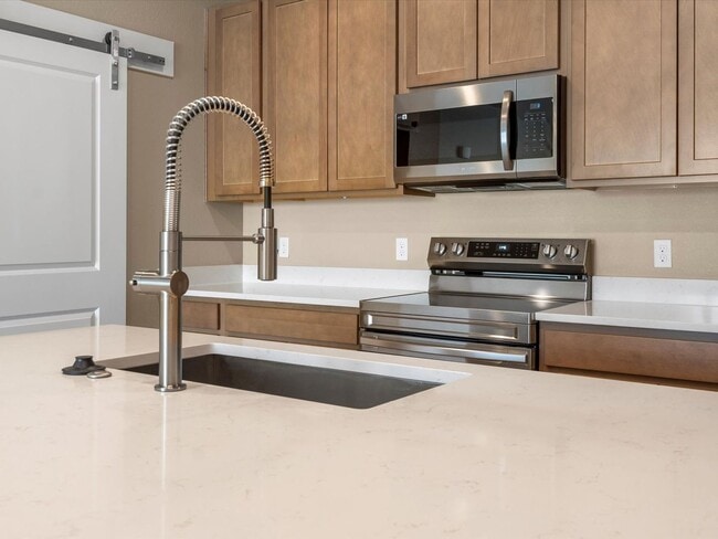 Photo - Modern 2-Bedroom Condo with Private Patio & Garage in Denver’s Gateway Corridor