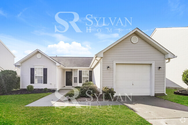 Building Photo - This charming home is waiting for you.