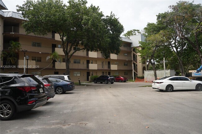 Building Photo - 6001 N Falls Cir Dr Unit 203