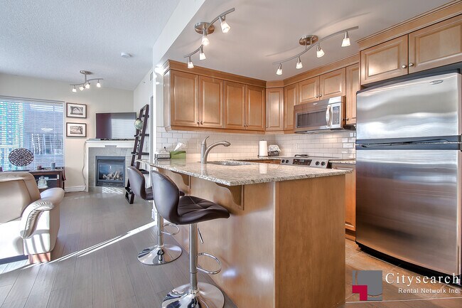 Photo - 920-805 5 Ave SW