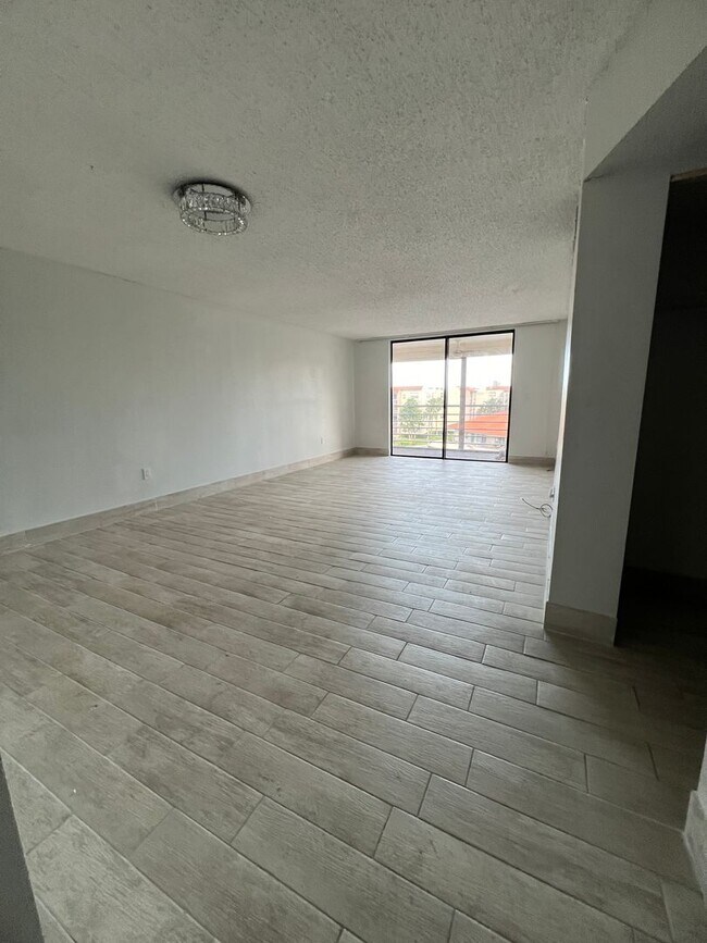 Photo - Great unit with pool view, pretty tile flooring.