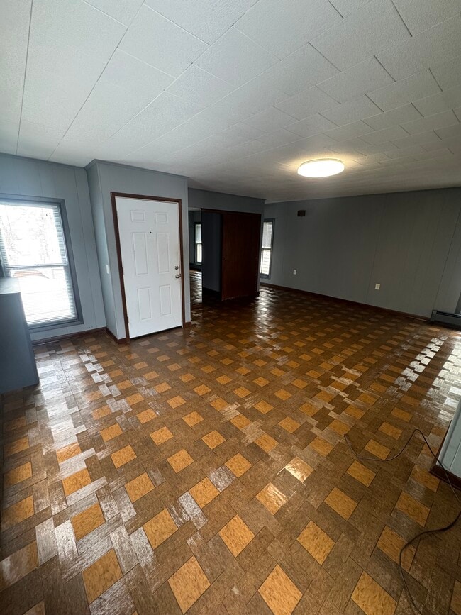 Living room with apartment entrance - 109 Plymouth Ave Unit 2