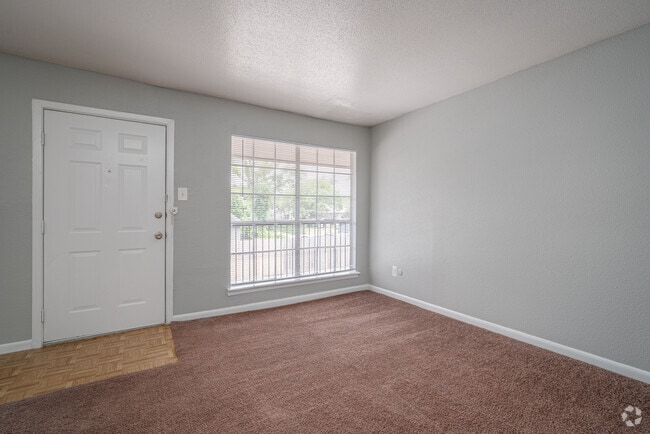 1BR, 1BA - 650SF - Living Room - Pecan Villa Apartments