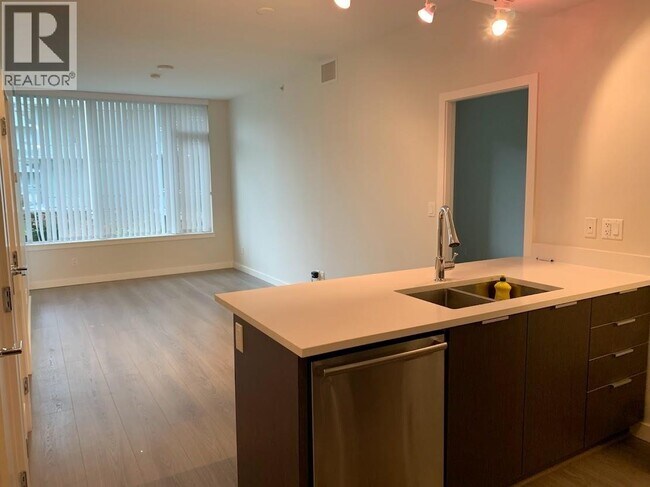 Photo - 3333 Sexsmith Rd Unité 6F