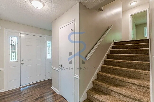 Photo - Move in before December 15th and choose your reward: a $250 Amazon Gift Card or a 55" Smart TV!