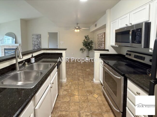 Photo - Luxury upstairs home overlooks with water views from every window and the balcony